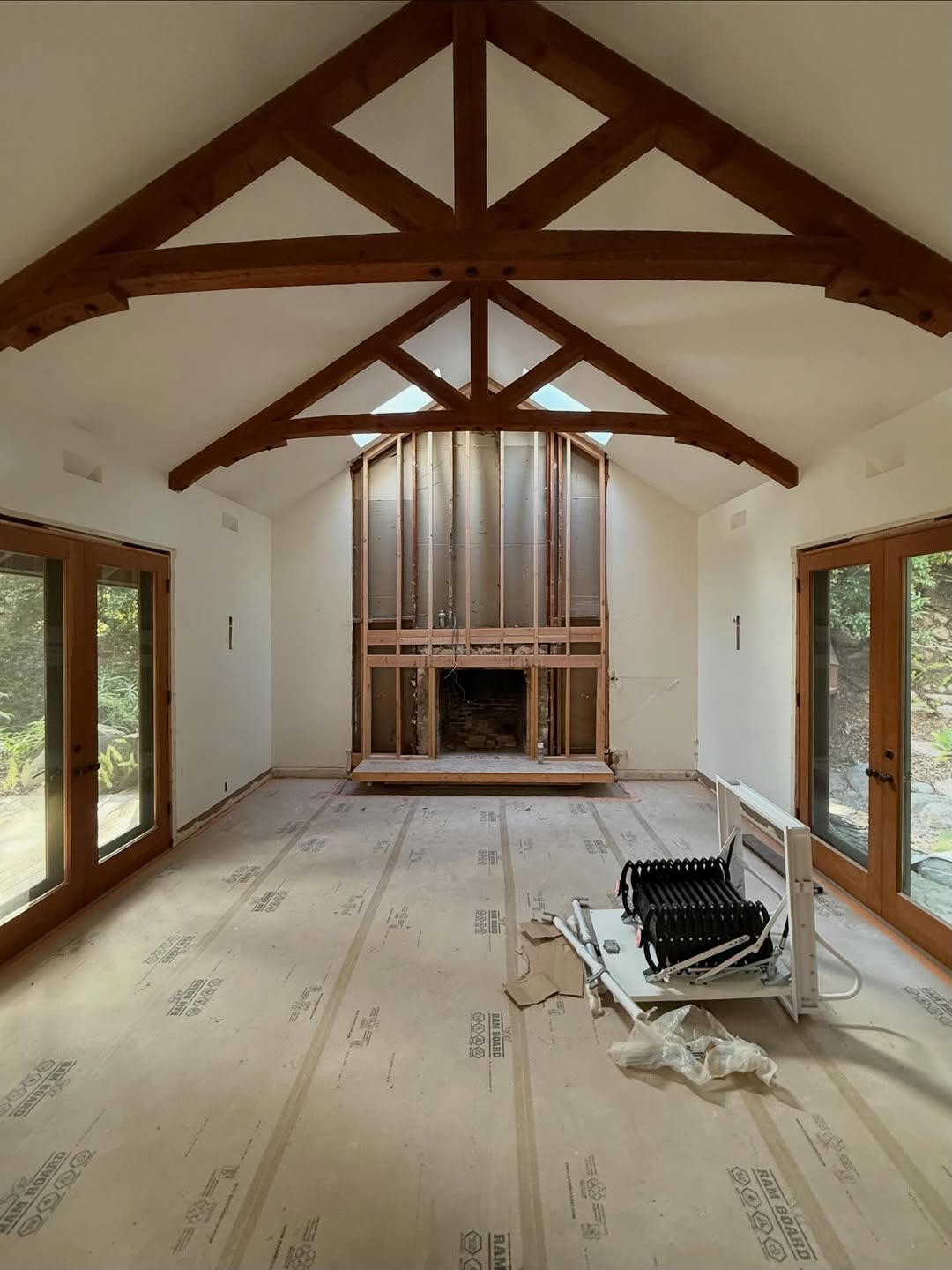 We always look at the ceiling as part of the architecture, not an afterthought. The vaulted form here opens everything up, draws your eye upward, and lets the natural light do most of the work. Even in its raw state, you can already feel what the space is going to become.
Before finishes, before furniture, this is the moment that matters. The vaulted ceilings set the tone, giving the space volume, light, and presence. When the structure is right, everything that comes after just supports it.